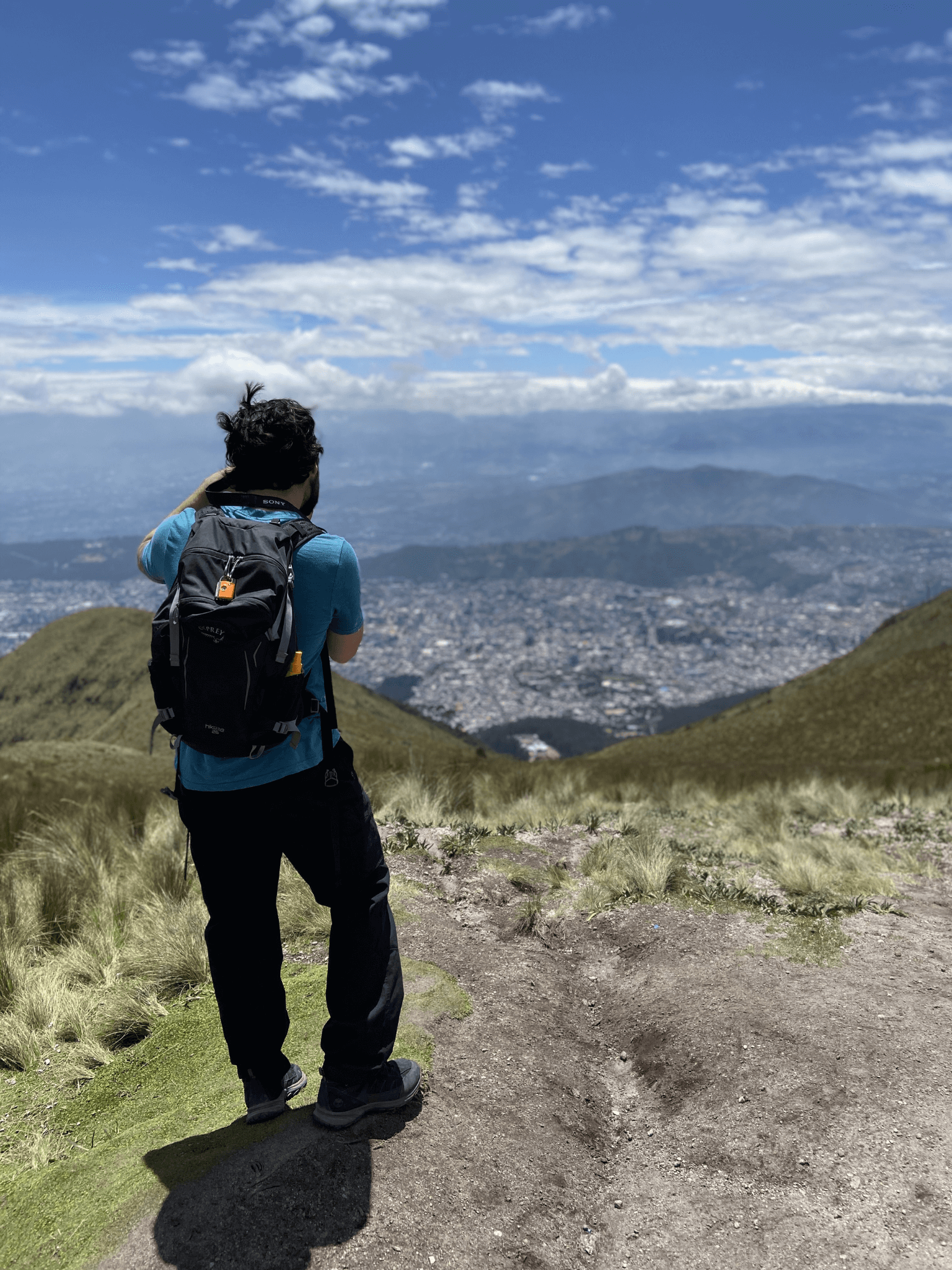 Alex taking a photo of Quito from Rucu Pichincha